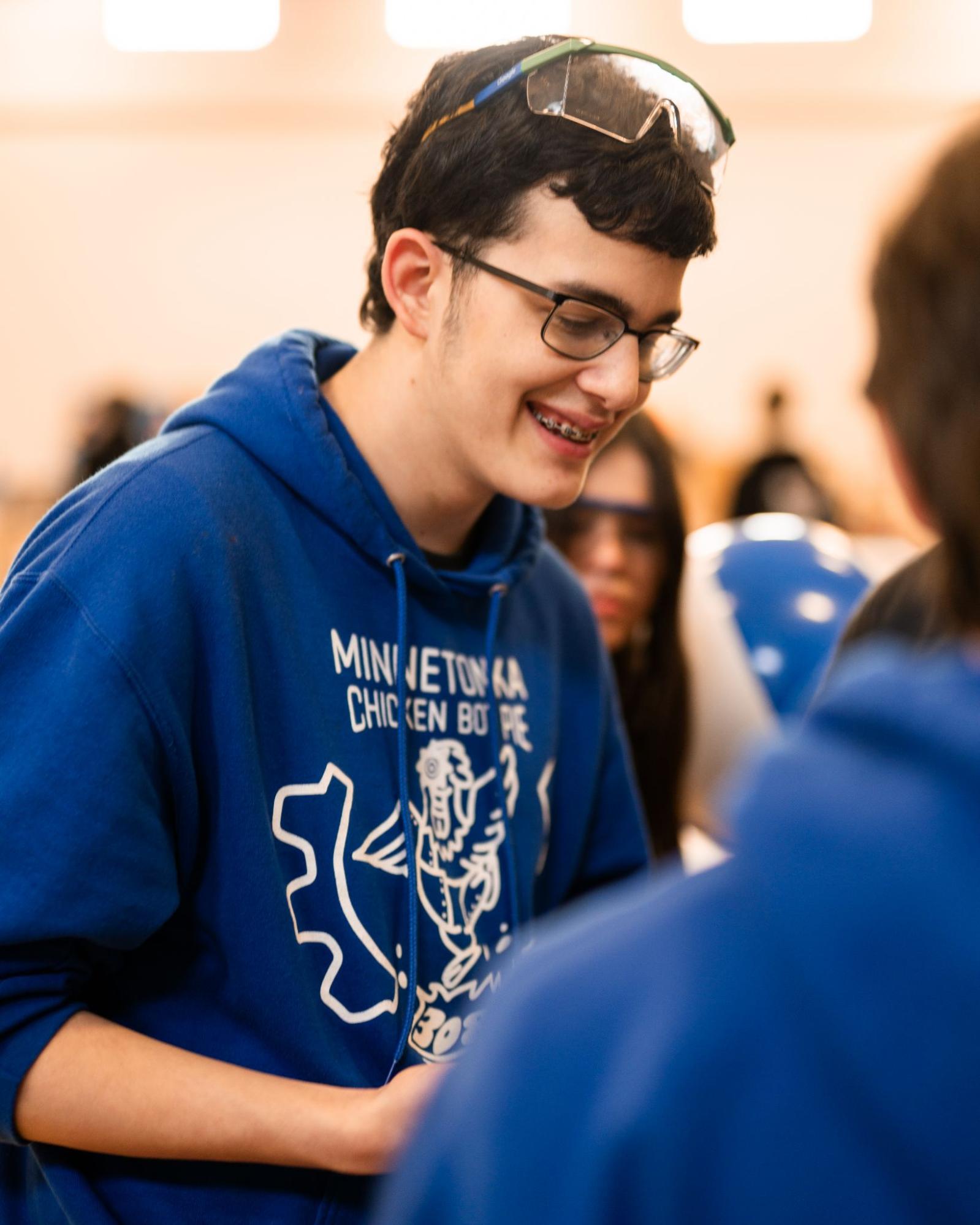 Picture of Emilio M wearing blue ChickenBotPie sweatshirt